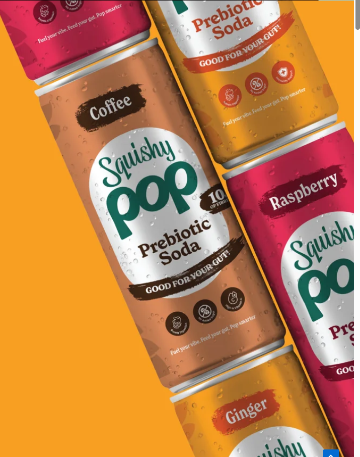 Close-up of Squishy Pop Coffee, Ginger and Raspberry cans covered in condensation